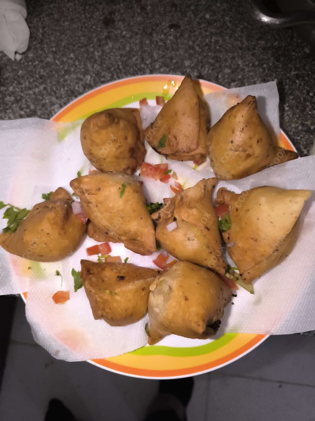 Delicious Mini Samosas prepared by COOX