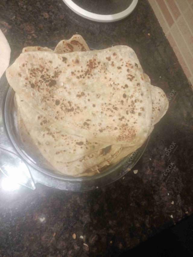 Delicious Naan (Butter / Garlic) prepared by COOX