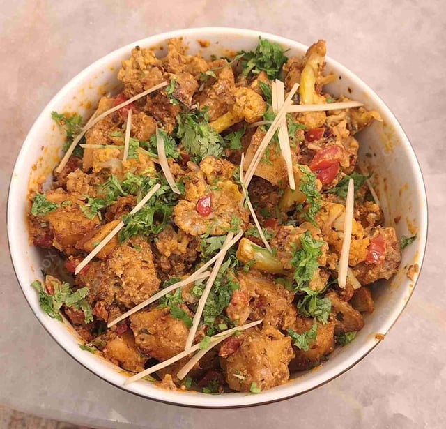 Delicious Aloo Gobhi prepared by COOX