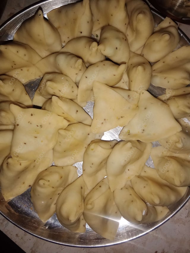 Delicious Mini Samosas prepared by COOX