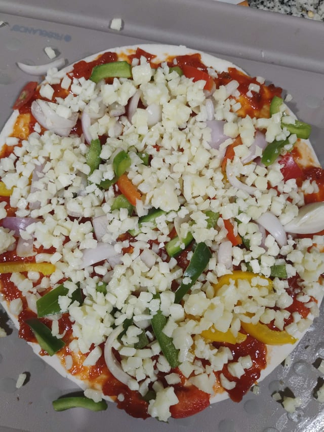 Delicious Veg Pizza prepared by COOX