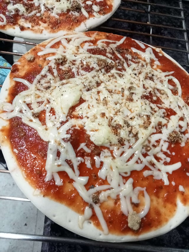 Delicious Margherita Pizza prepared by COOX