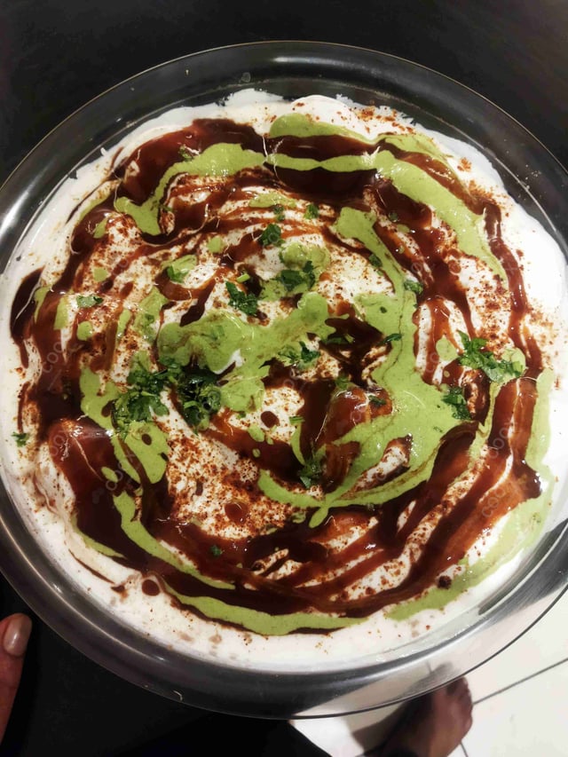 Delicious Dahi Bhalla prepared by COOX