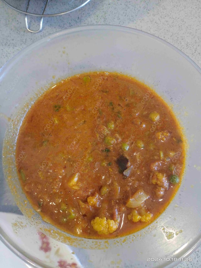 Delicious Gobhi Matar prepared by COOX