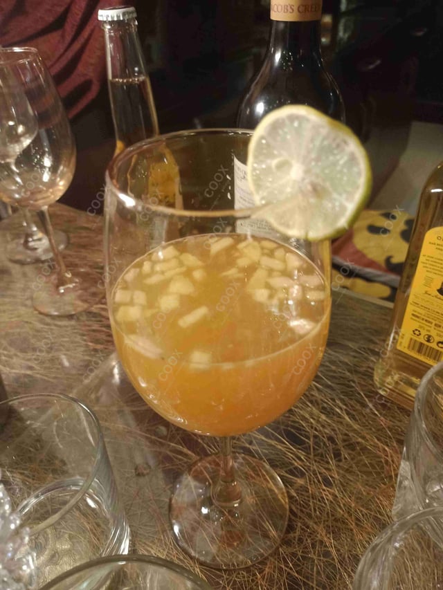 Delicious White Wine Sangria prepared by COOX