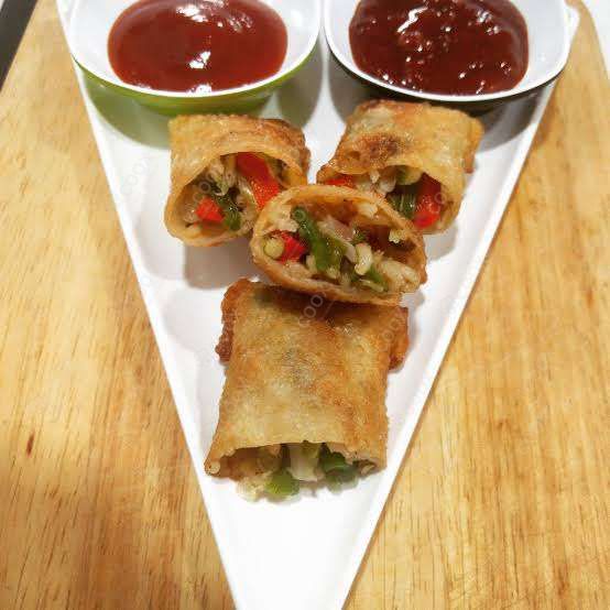 Delicious Veg Spring Rolls prepared by COOX