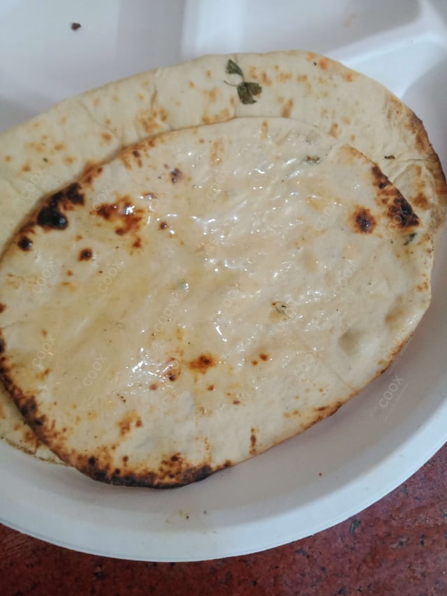 Delicious Naan (Butter / Garlic) prepared by COOX