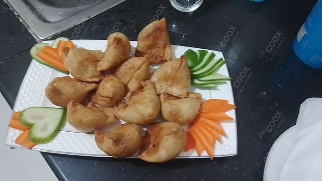 Delicious Mini Samosas prepared by COOX