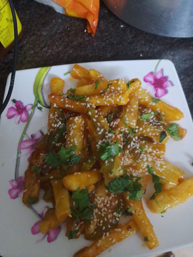 Delicious Honey Chilli Potato prepared by COOX