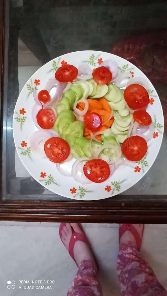 Delicious Salad, Raita, Papad prepared by COOX