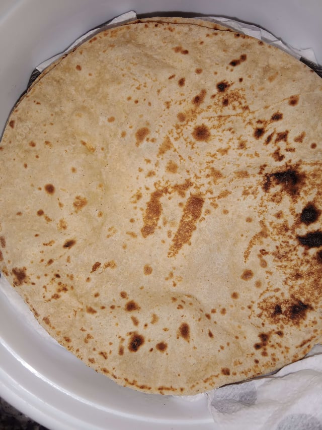 Delicious Tawa Rotis prepared by COOX