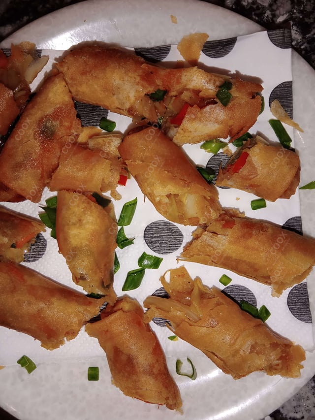 Delicious Veg Spring Rolls prepared by COOX