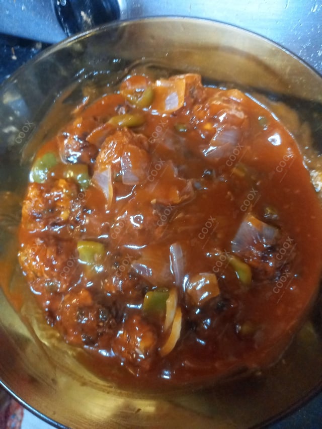 Delicious Veg Manchurian (Gravy) prepared by COOX