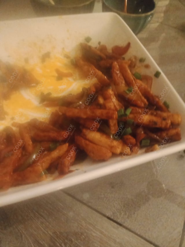 Delicious Honey Chilli Potato prepared by COOX