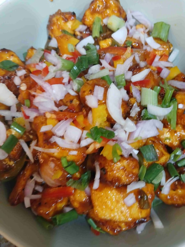 Delicious Chilli Paneer (Dry) prepared by COOX