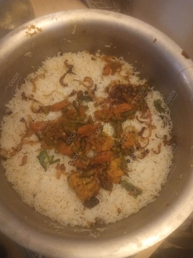 Delicious Veg Biryani prepared by COOX