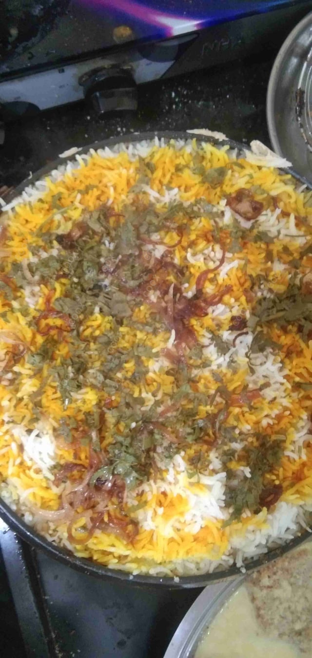 Delicious Veg Biryani prepared by COOX