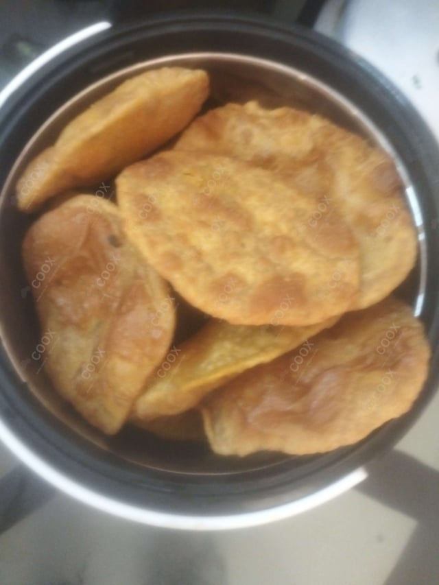 Delicious Pooris & Bedmis prepared by COOX