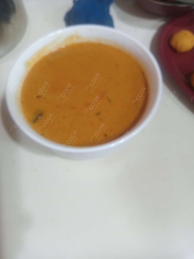 Delicious Malai Kofta (Orange Gravy) prepared by COOX