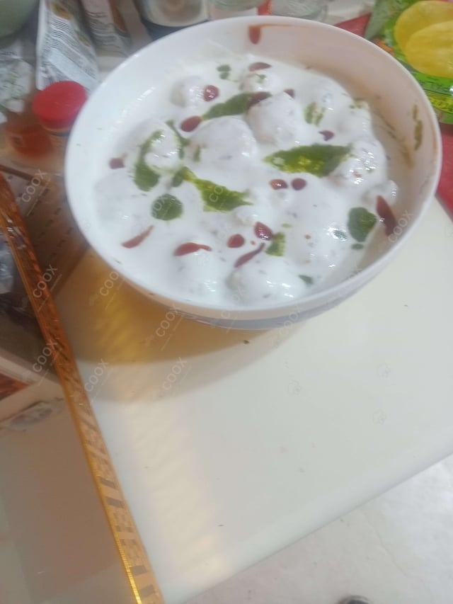 Delicious Dahi Bhalla prepared by COOX