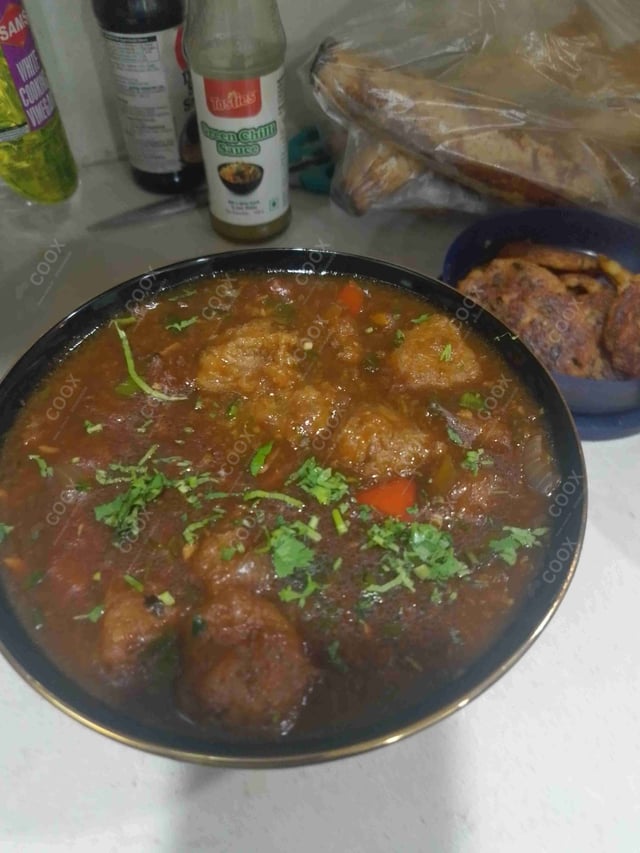 Delicious Veg Manchurian (Gravy) prepared by COOX