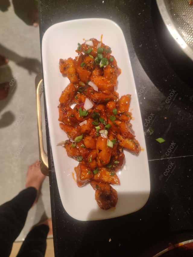 Delicious Honey Chilli Potato prepared by COOX