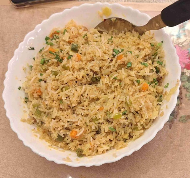 Delicious Veg Fried Rice prepared by COOX