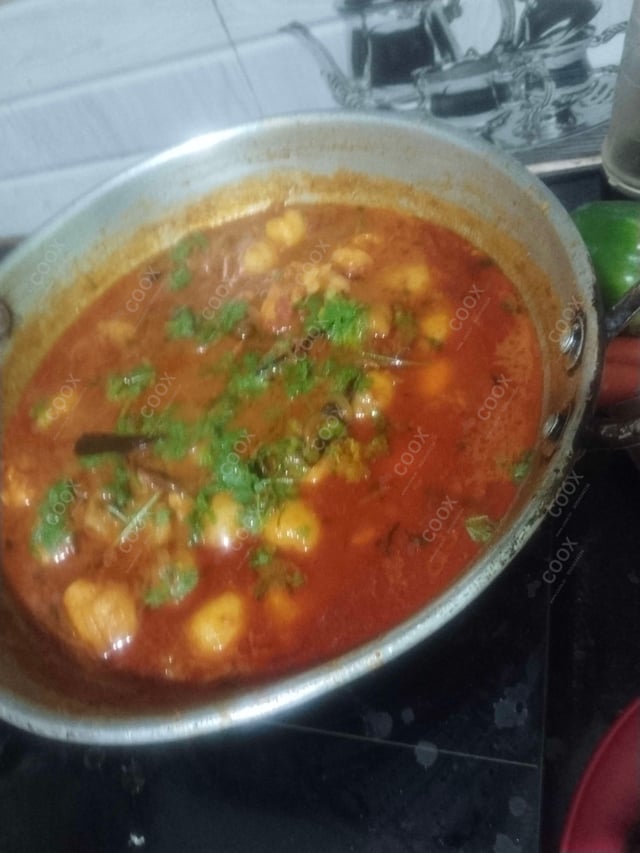 Delicious Dum Aloo prepared by COOX