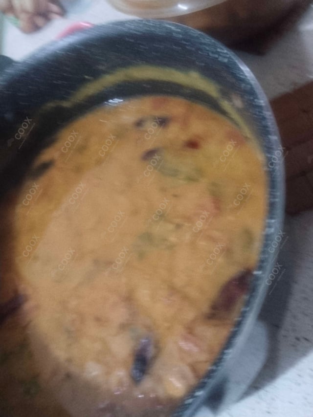 Delicious Dal Tadka prepared by COOX