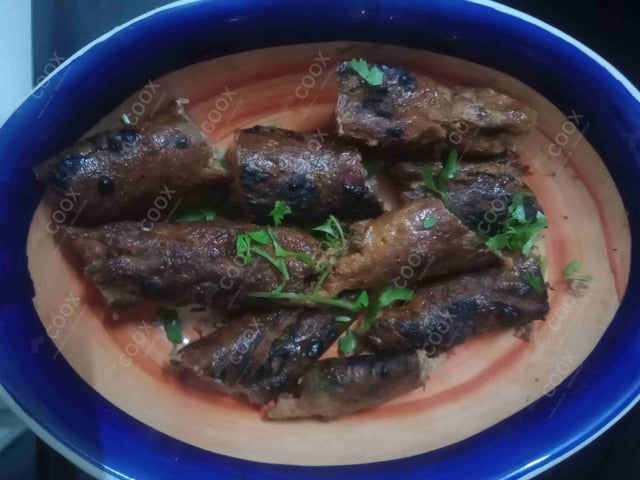 Delicious Mutton Seekh Kebab prepared by COOX