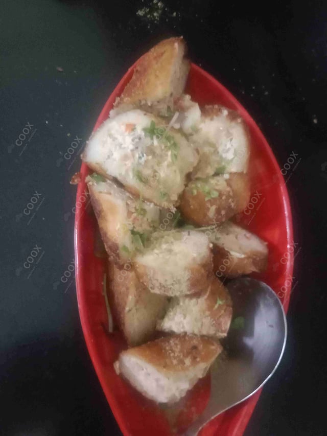 Delicious Dahi ke Sholey prepared by COOX