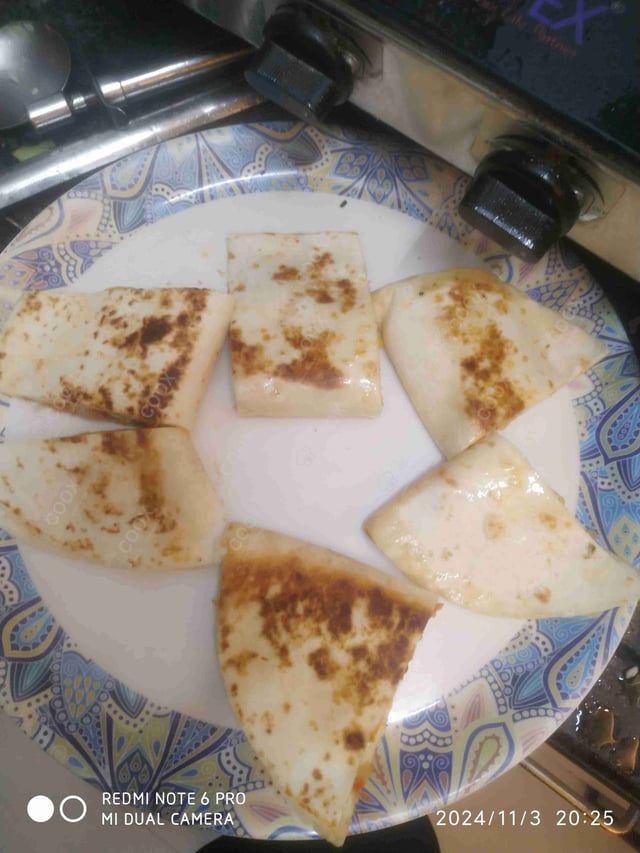 Delicious Veg Quesadillas prepared by COOX