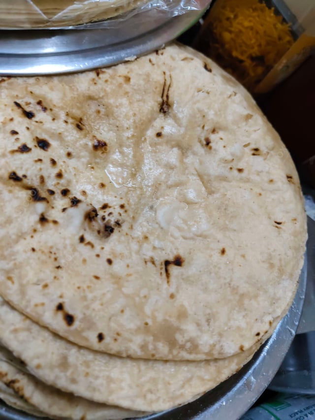 Delicious Tawa Rotis prepared by COOX