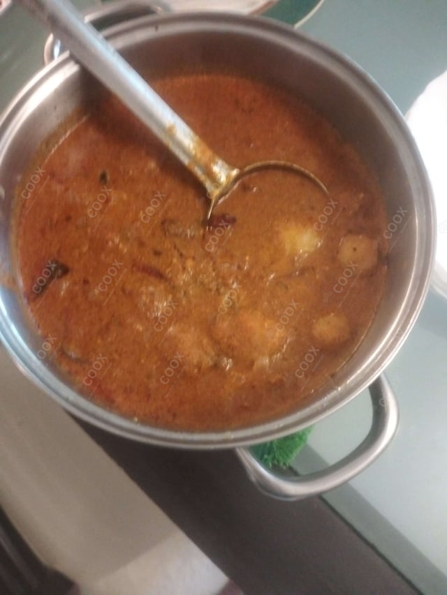 Delicious Dum Aloo prepared by COOX