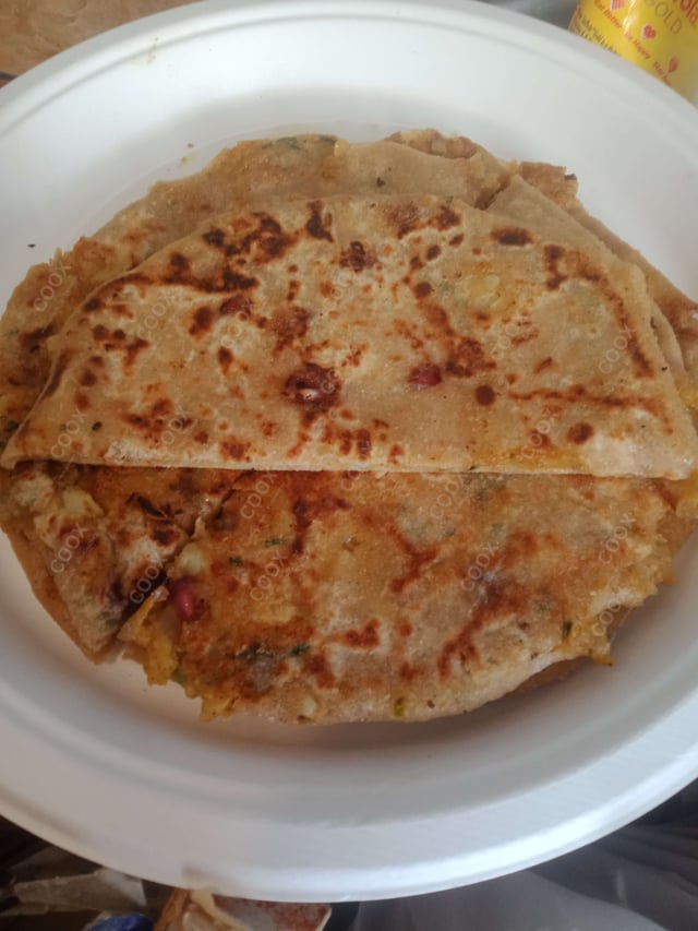 Delicious Stuffed Paranthas prepared by COOX