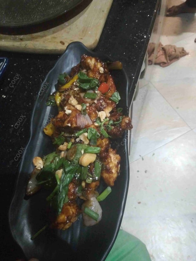 Delicious Kung Pao Chicken prepared by COOX