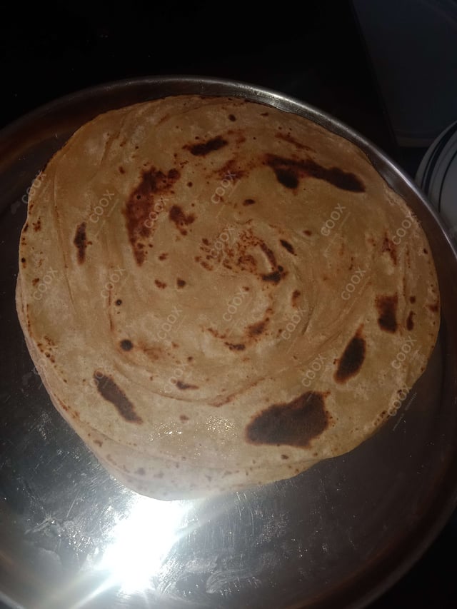 Delicious Lachha Parathas prepared by COOX