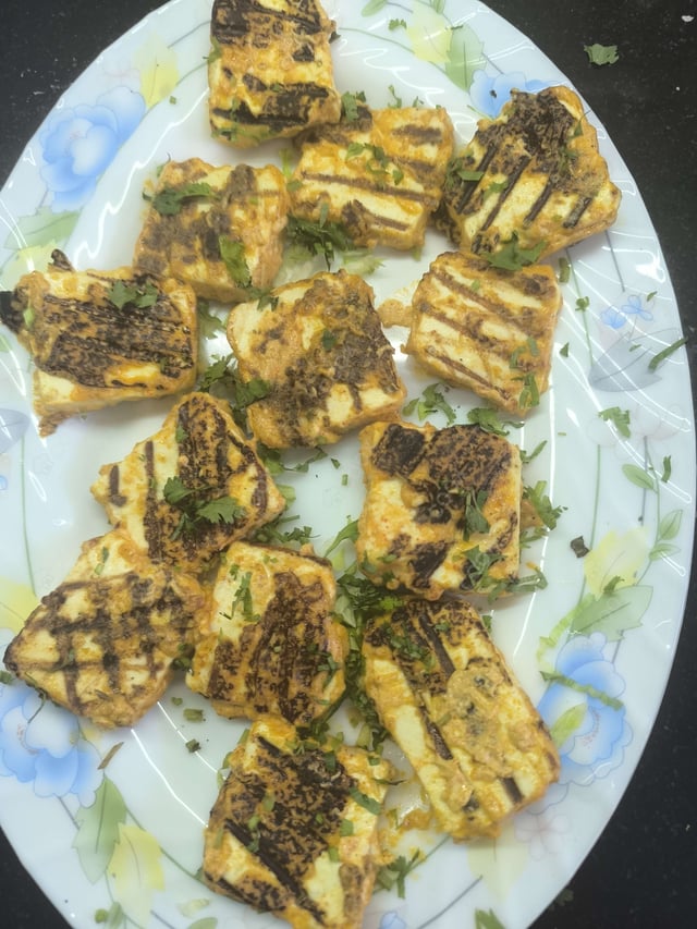 Delicious Paneer Tikka prepared by COOX