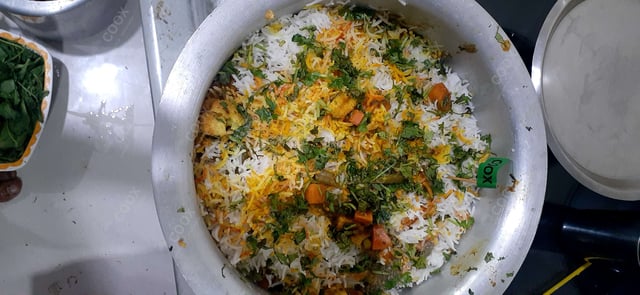 Delicious Veg Biryani prepared by COOX