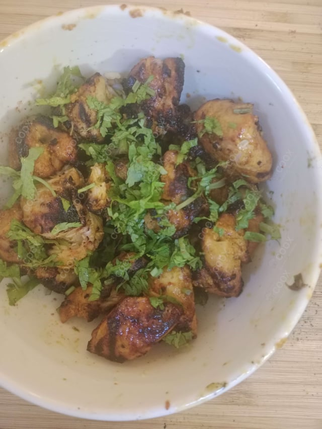 Delicious Chicken Tikka prepared by COOX