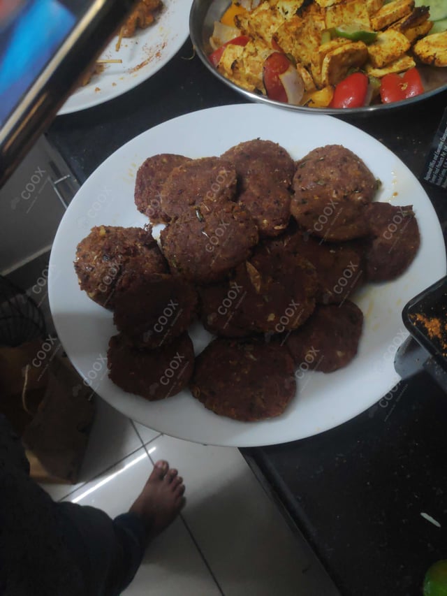 Delicious Mutton Seekh Kebab prepared by COOX