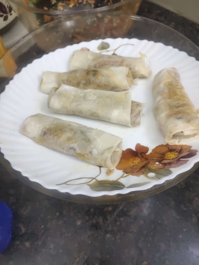 Delicious Veg Spring Rolls prepared by COOX