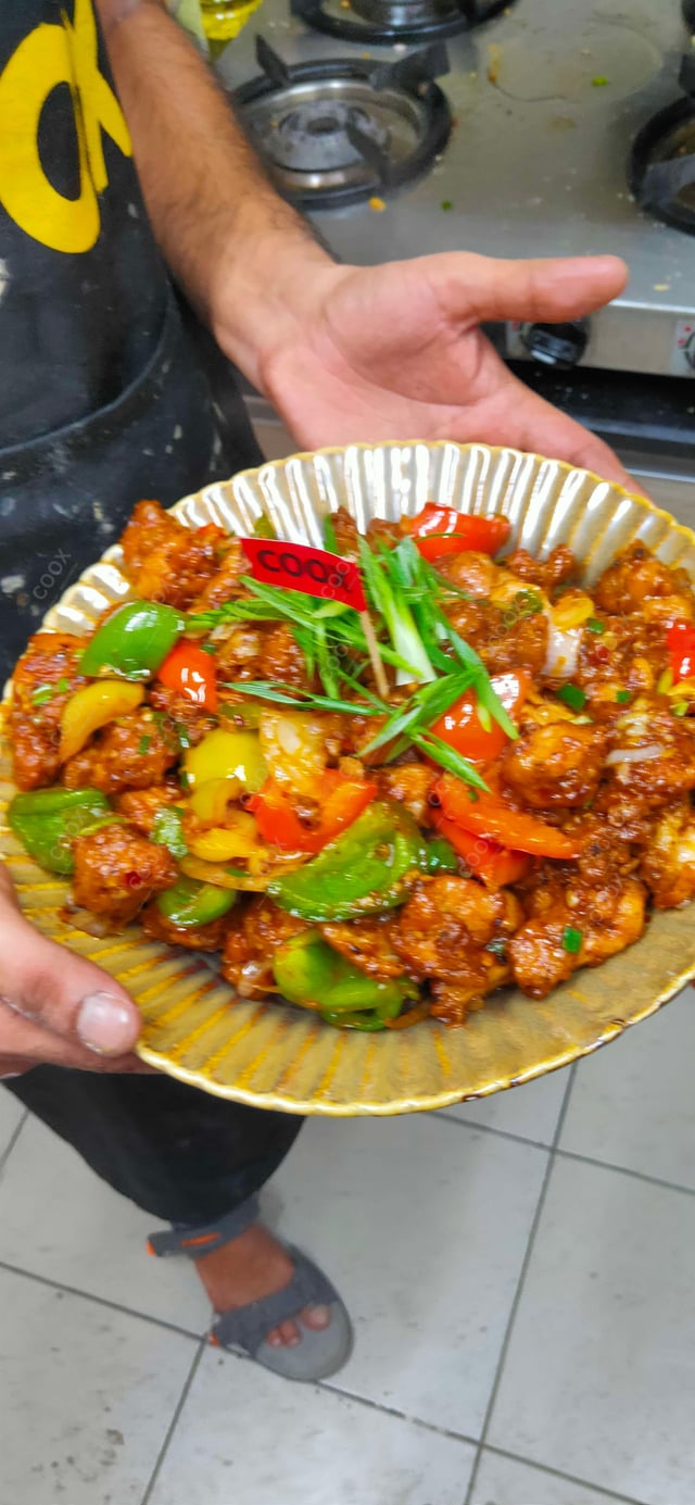 Delicious Kung Pao Chicken prepared by COOX