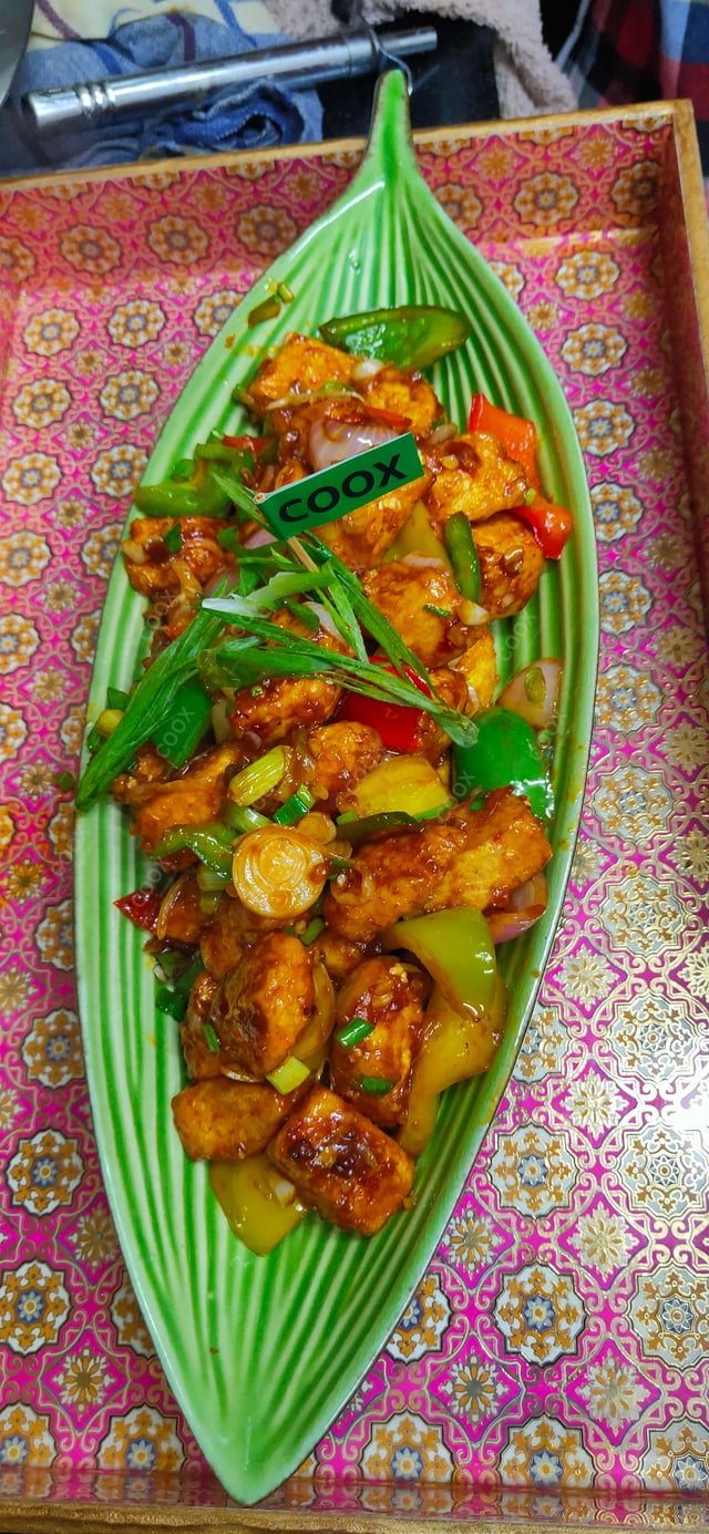 Delicious Chilly Paneer prepared by COOX