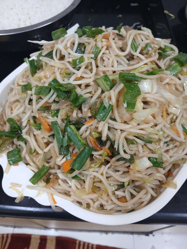 Delicious Veg Hakka Noodles prepared by COOX