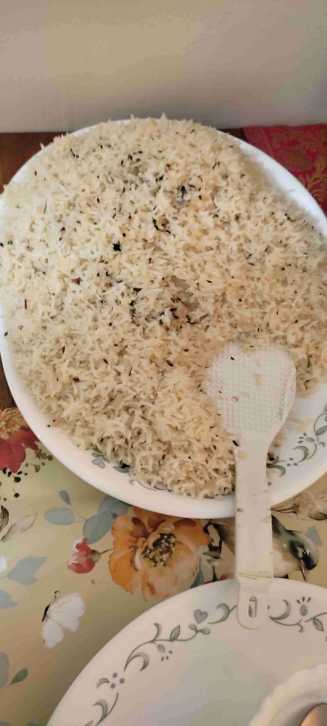 Delicious Jeera Rice prepared by COOX