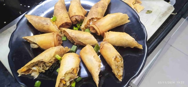 Delicious Veg Spring Rolls prepared by COOX