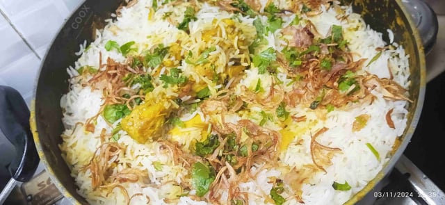 Delicious Chicken Biryani prepared by COOX