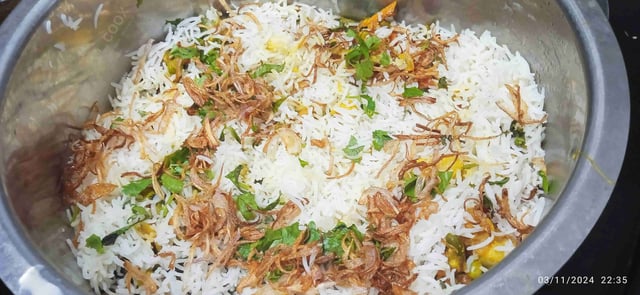 Delicious Veg Biryani prepared by COOX