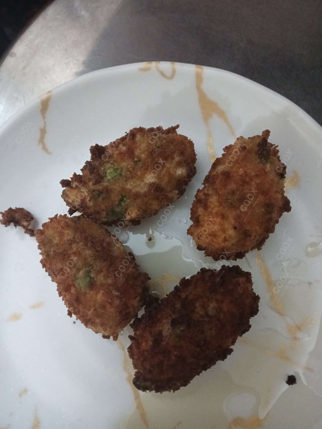 Delicious Veg Cutlets prepared by COOX